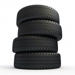 Stack of new tires isolated on white - 3d render